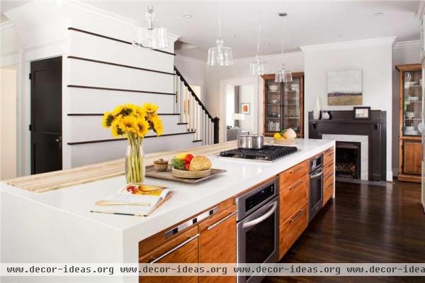 Open Transitional Kitchen by TerraCotta Properties