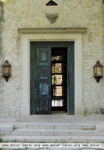 mediterranean entry by Susan Newell Custom Home Builder, Inc.