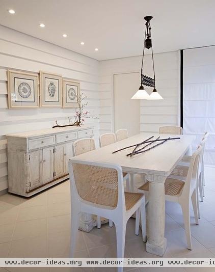 contemporary dining room by Marcelo Brito & Pedro Potaris