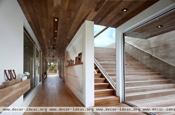 modern staircase by Bates Masi Architects LLC