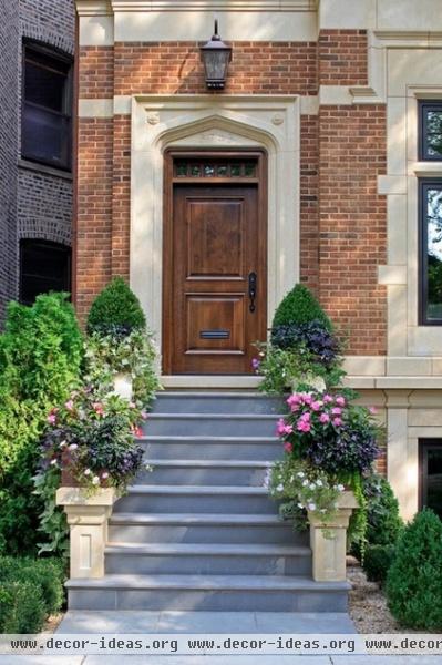 traditional exterior by Burns and Beyerl Architects