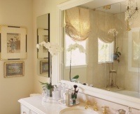Master bath with Crema Marfil marble and mirrored silk window treatment - traditional - bathroom - los angeles