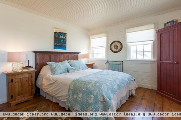 My Houzz: Rustic Summer Home in Heritage Community Trinity - traditional - bedroom - other metro