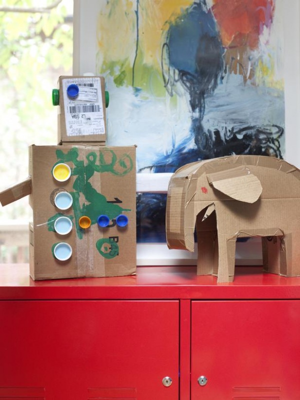 Cardboard Art Projects on Red Cabinet With Wall Art in Background : Designers' Portfolio