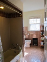 Room of the Day: A Family Bath With Vintage Apothecary Style