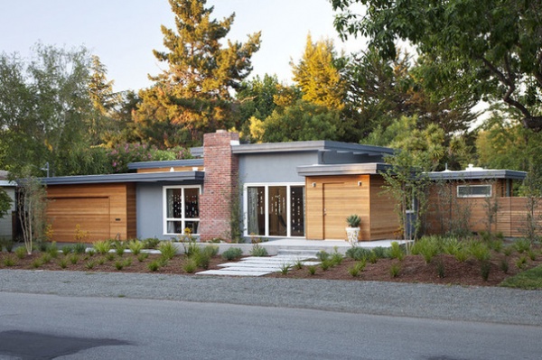 Midcentury Exterior by Klopf Architecture