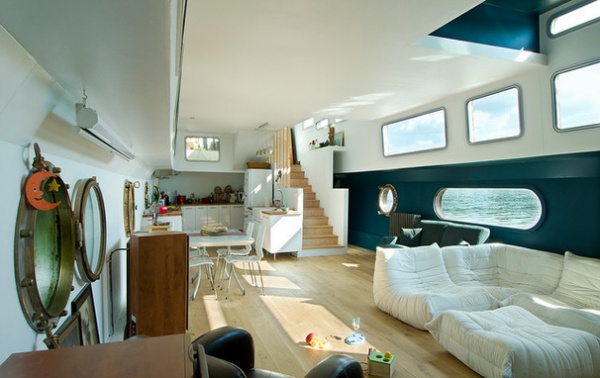 Beach Style Dining Room by yann coulouarn architecte