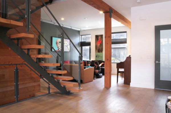 Transitional Dining Room by Esther Hershcovich