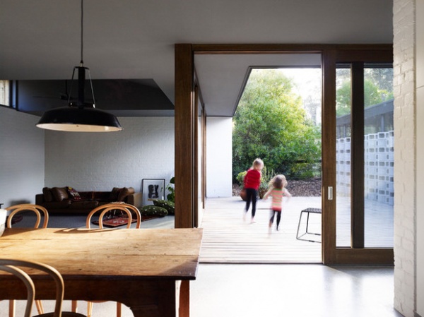 Contemporary Dining Room by Kennedy Nolan