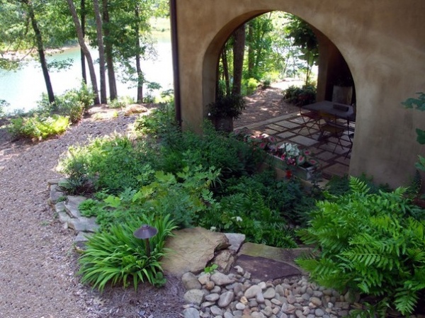 Traditional Landscape by Earth Design, Inc.