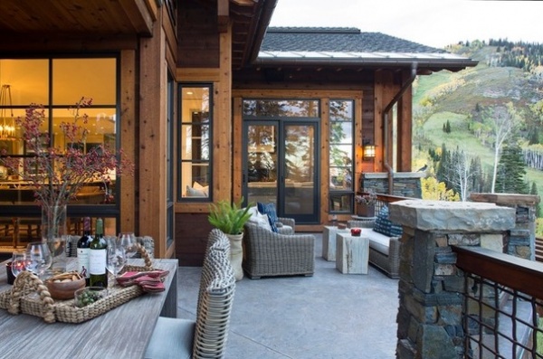 Rustic Exterior by Massucco Warner Miller Interior Design