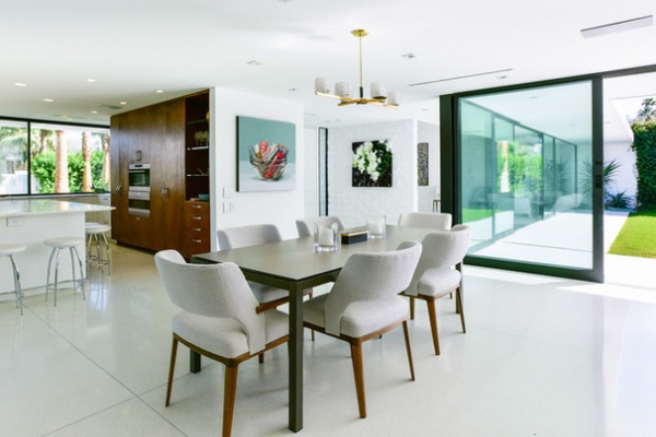 Midcentury Dining Room by Studio AR+D Architects