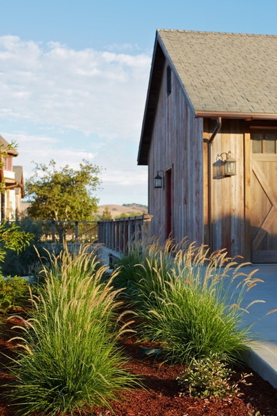 Rustic Landscape by Addison Landscape & Maintenance, Inc.