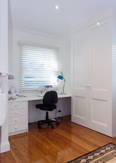 Transitional Home Office by Clever Closet Company